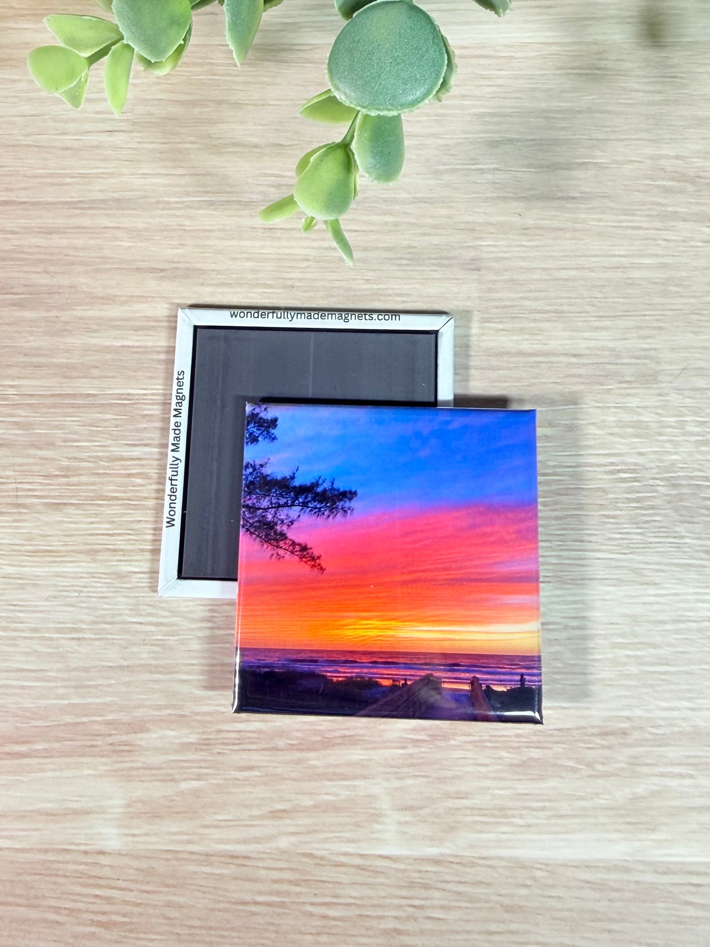 Front and back view of 2x2 custom photo magnet with landscape photo